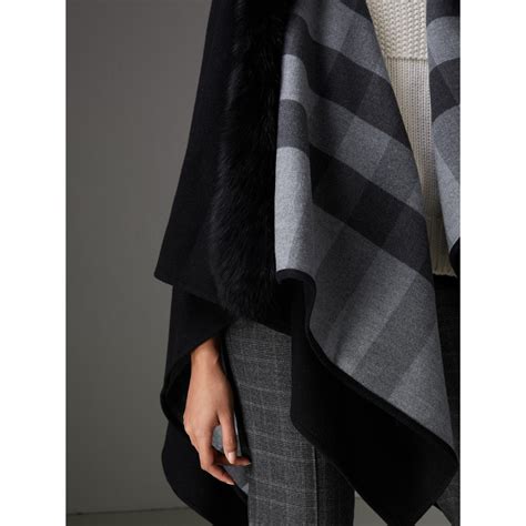 burberry fur trimmed poncho.